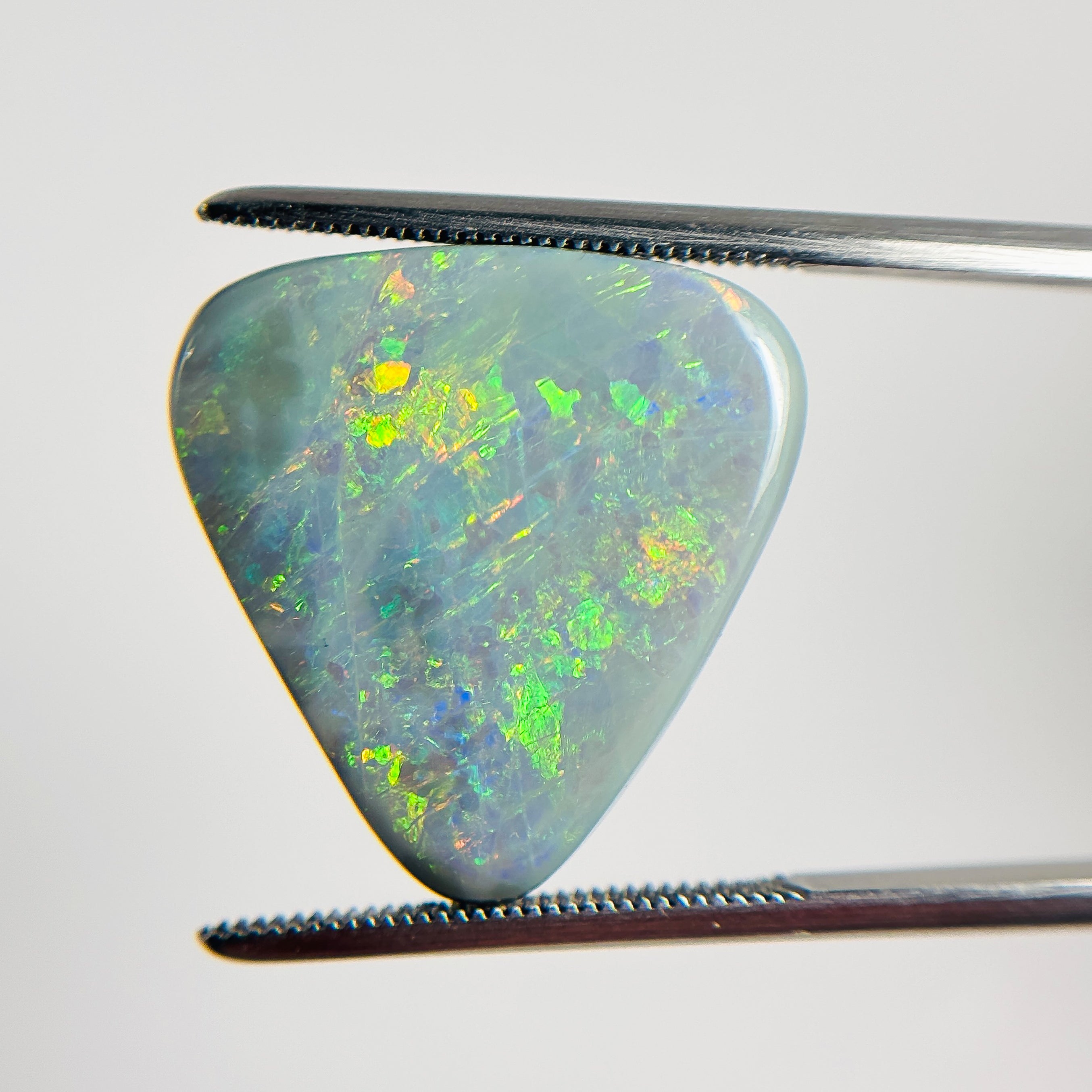 Semi Black Opal Green Multicolour 20x19x5 Cabochon Triangle 10.95 Carat