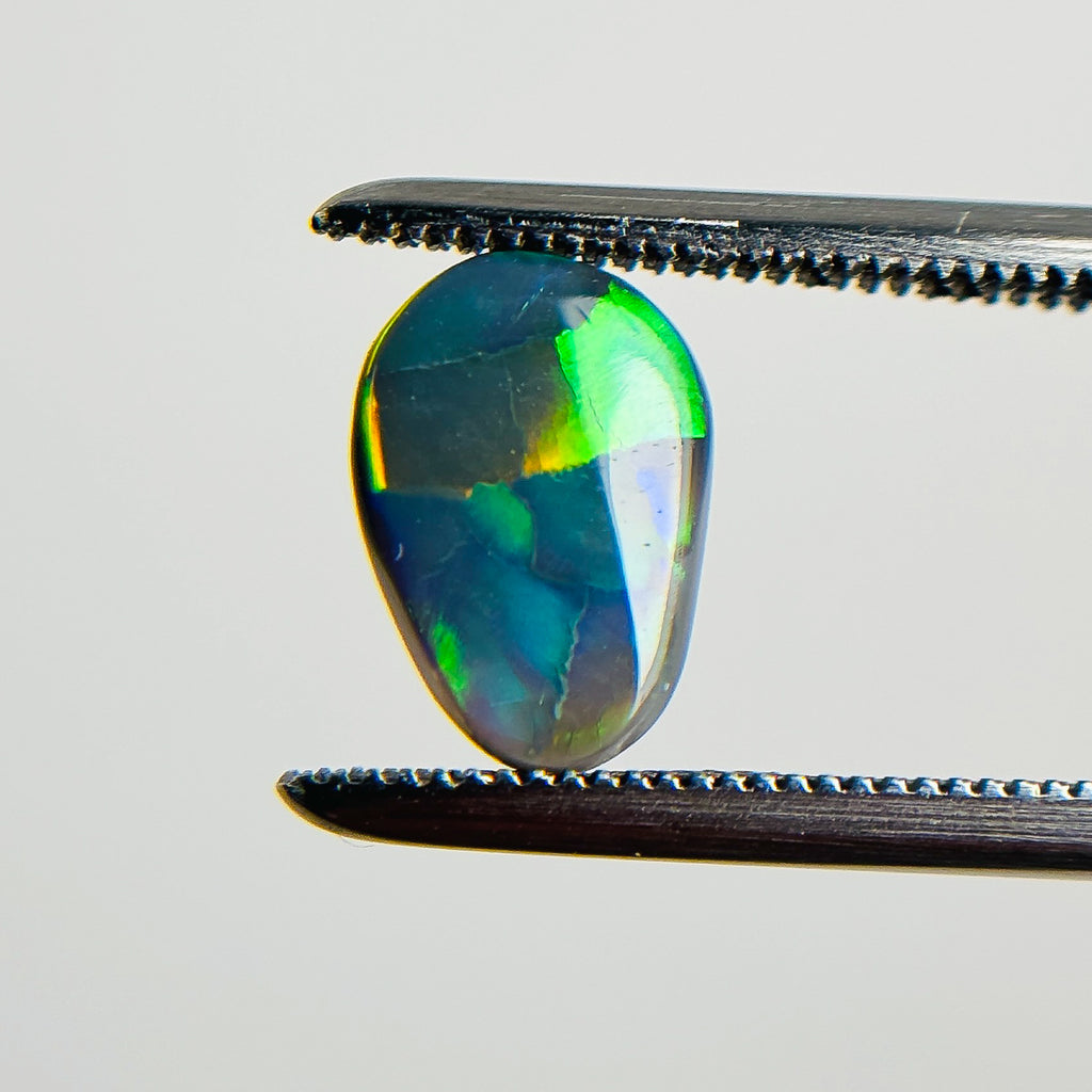 Semi Black Opal Multicolour 9x6x2.2 Cabochon Pear 0.9 Carat