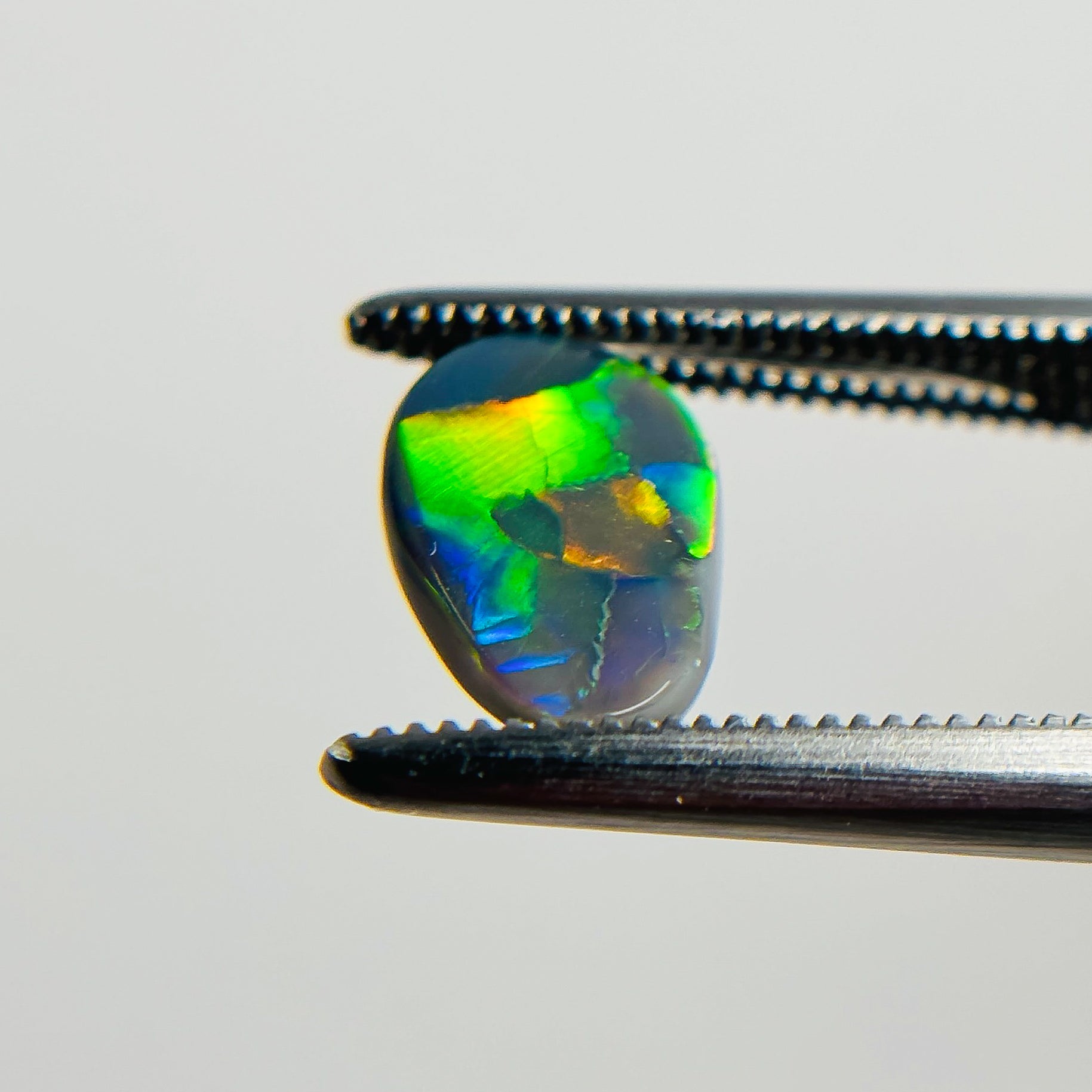 Semi Black Opal Multicolour 9x6x2.2 Cabochon Pear 0.9 Carat
