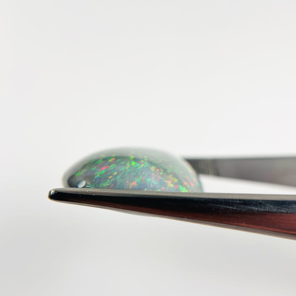 Semi Black Opal Red Green 28x21x7.2 Cabochon Pear 23.80 Carat