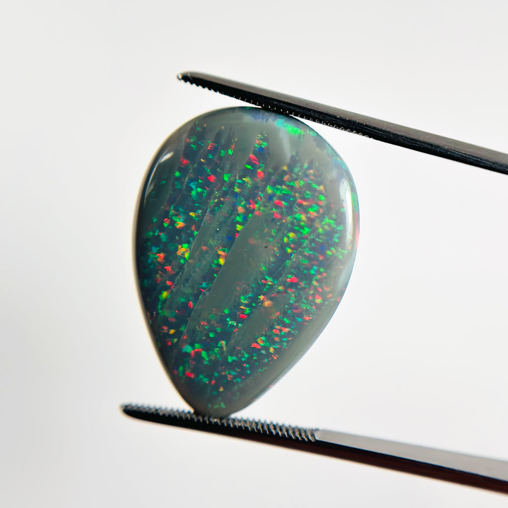 Semi Black Opal Red Green 28x21x7.2 Cabochon Pear 23.80 Carat