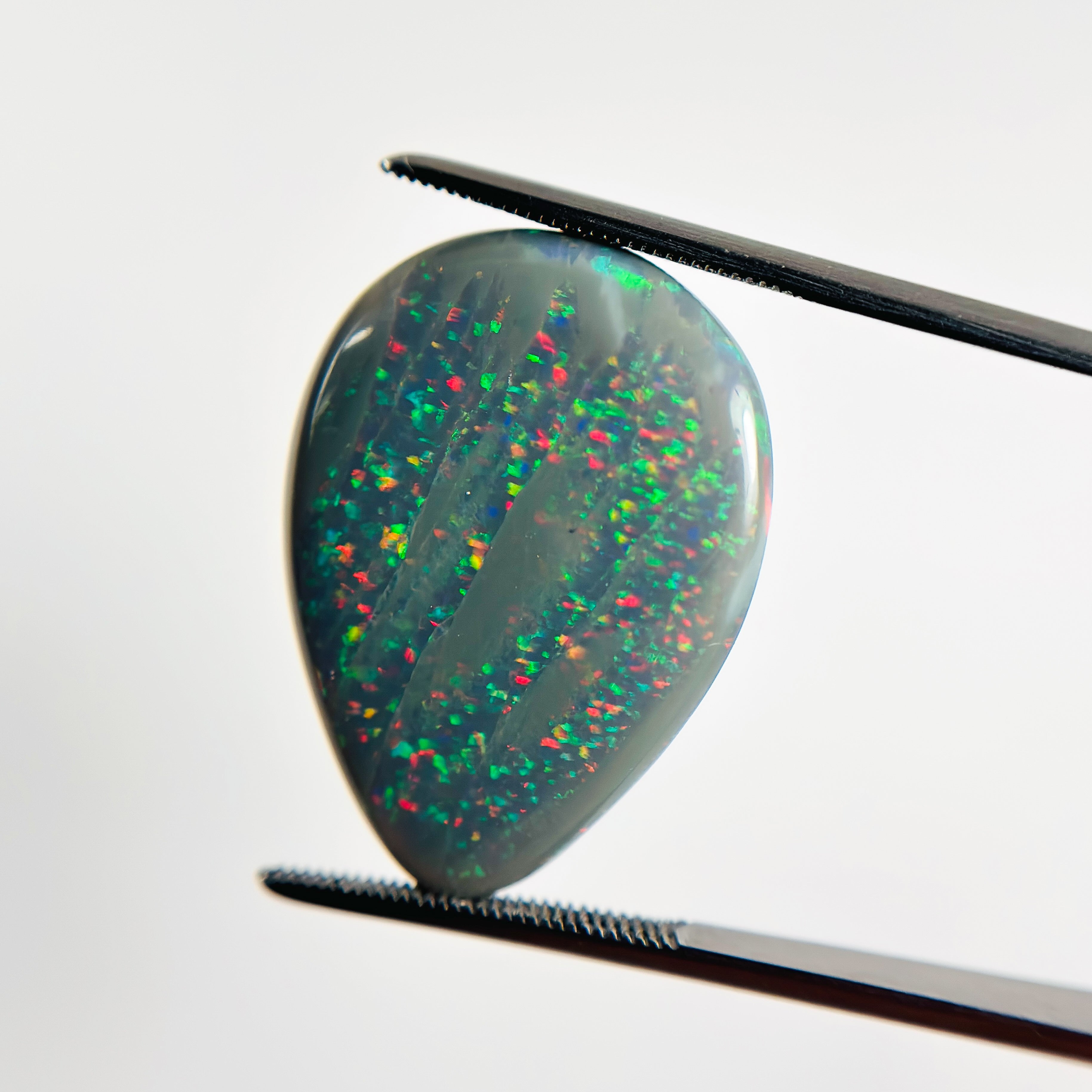 Semi Black Opal Red Green 28x21x7.2 Cabochon Pear 23.80 Carat