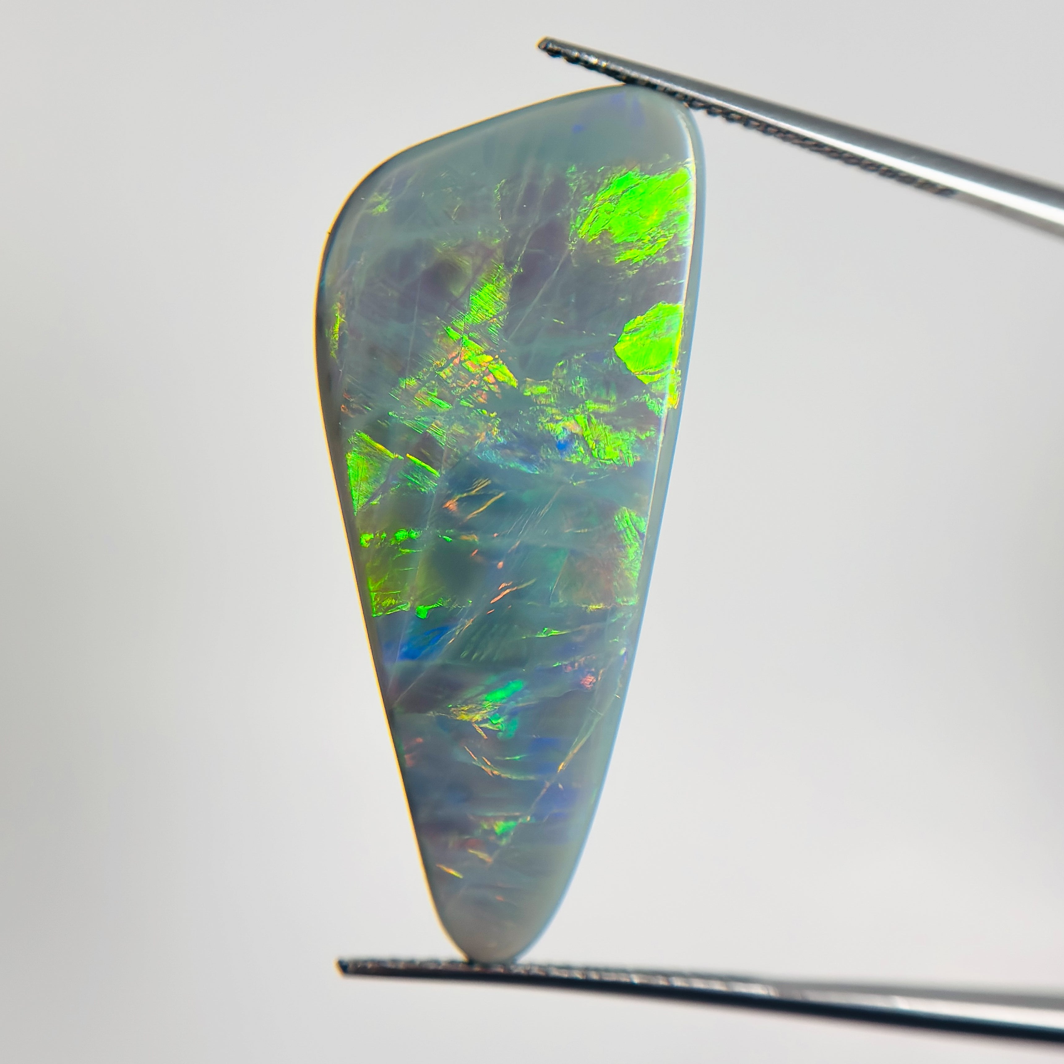 Semi Black Opal Green Multi 34x14x5.7 Cabochon Freeform 15.7 Carat