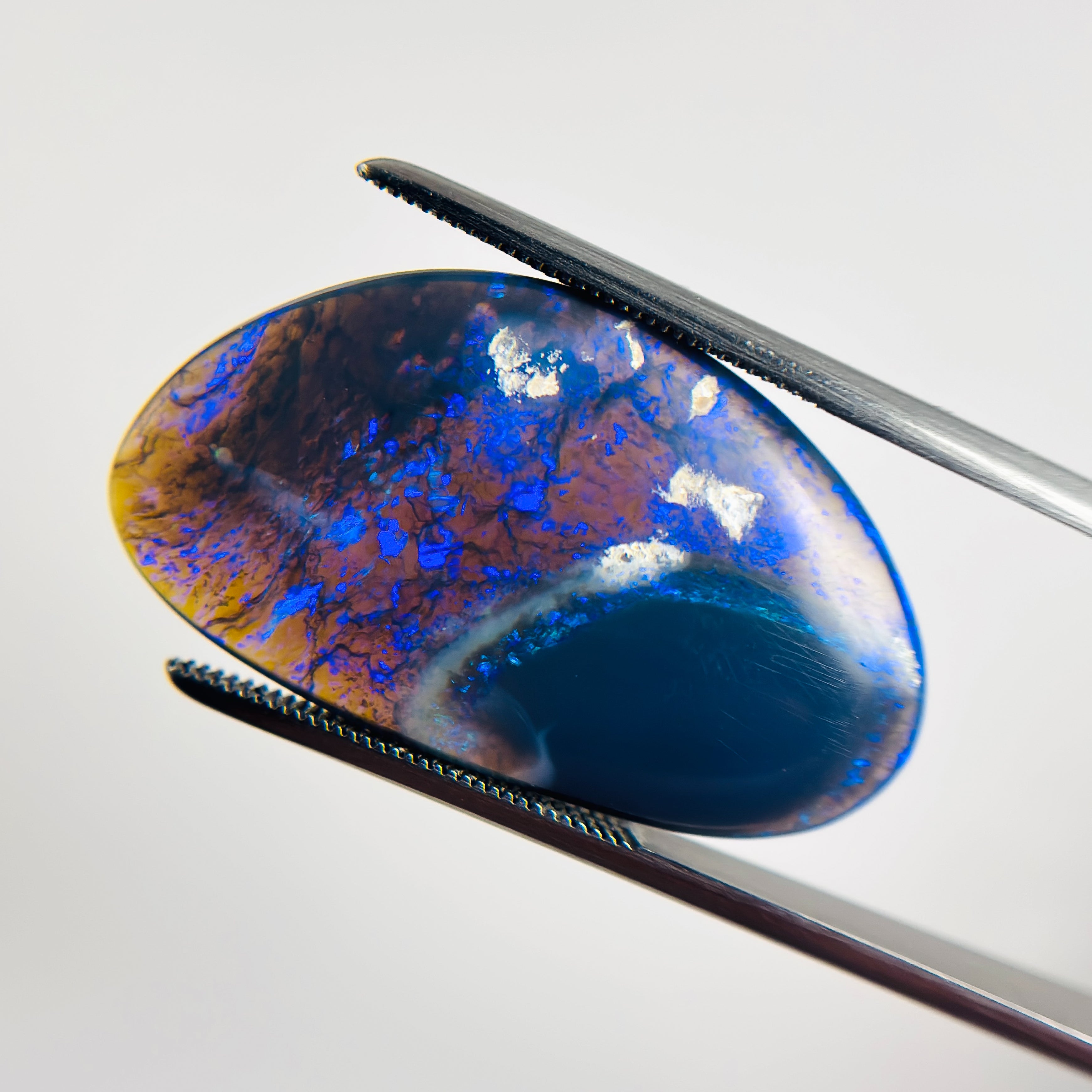 Black Opal Blue 30x17x4.5 Cabochon Freeform 14.4 Carat