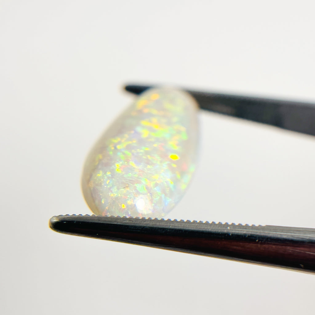 White Opal Multicolour 23x11x4.6 Cabochon Freeform 7 Carat