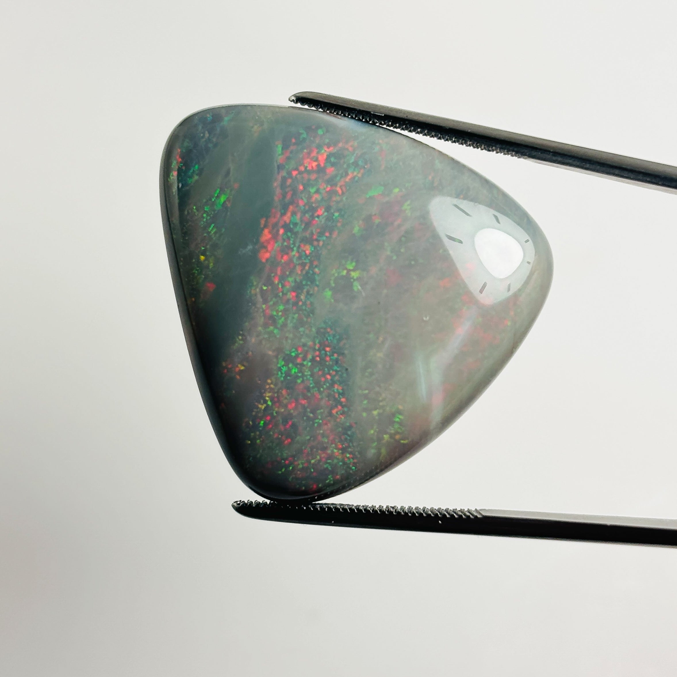 Semi Black Opal Red Multicolour 30x28x6.7 Cabochon Triangle 33.85 Carat