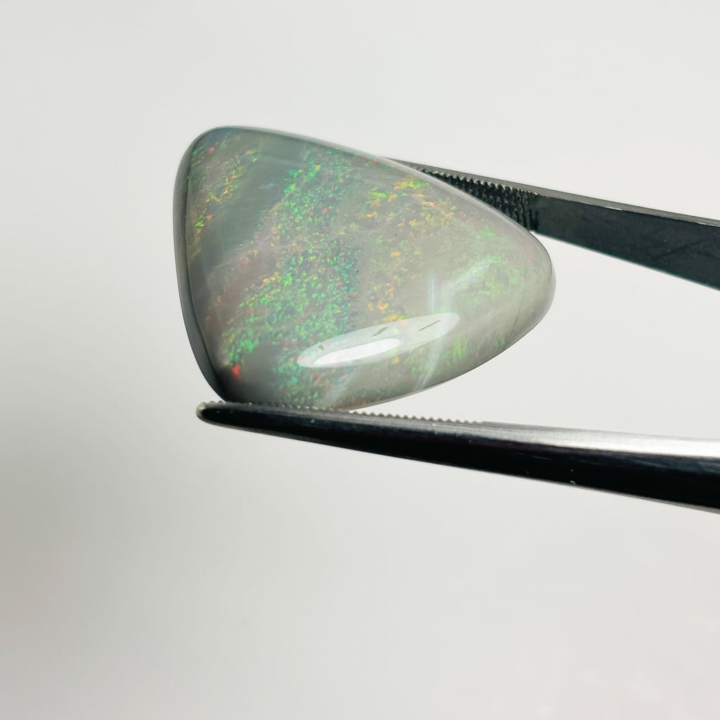 Semi Black Opal Red Multicolour 30x28x6.7 Cabochon Triangle 33.85 Carat