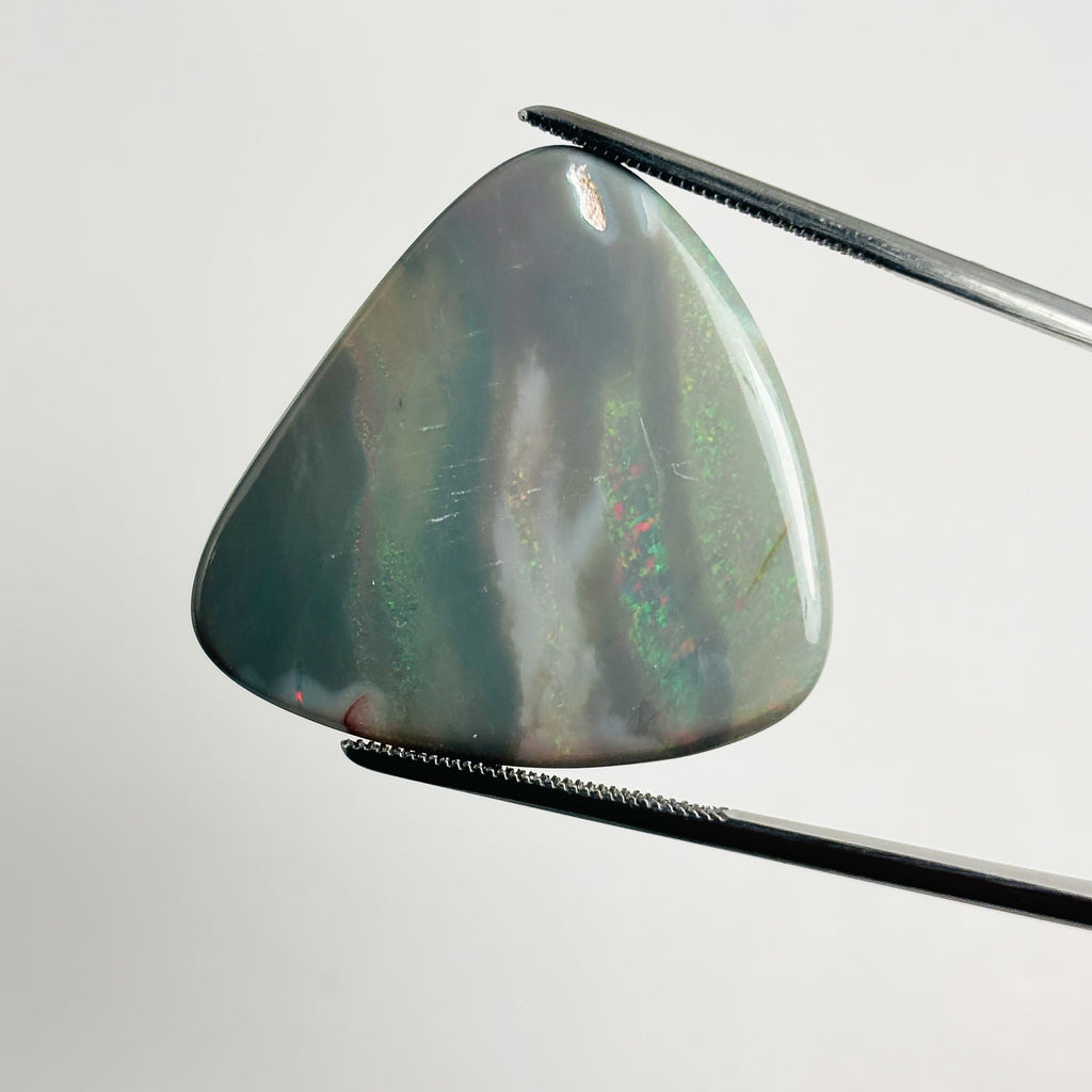 Semi Black Opal Red Multicolour 30x28x6.7 Cabochon Triangle 33.85 Carat