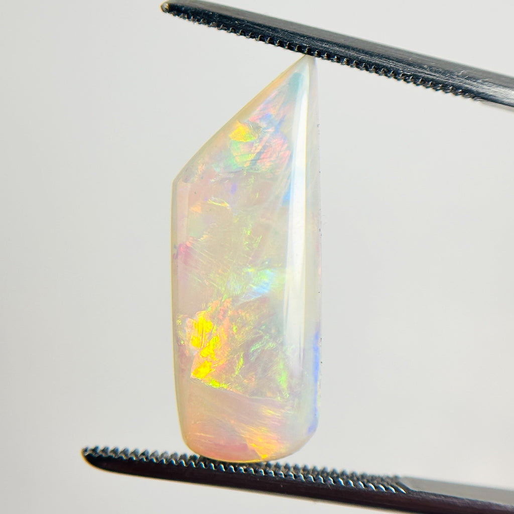 Crystal Opal Red Multicolour 22x8x3.6 Cabochon Freeform 4.75 Carat