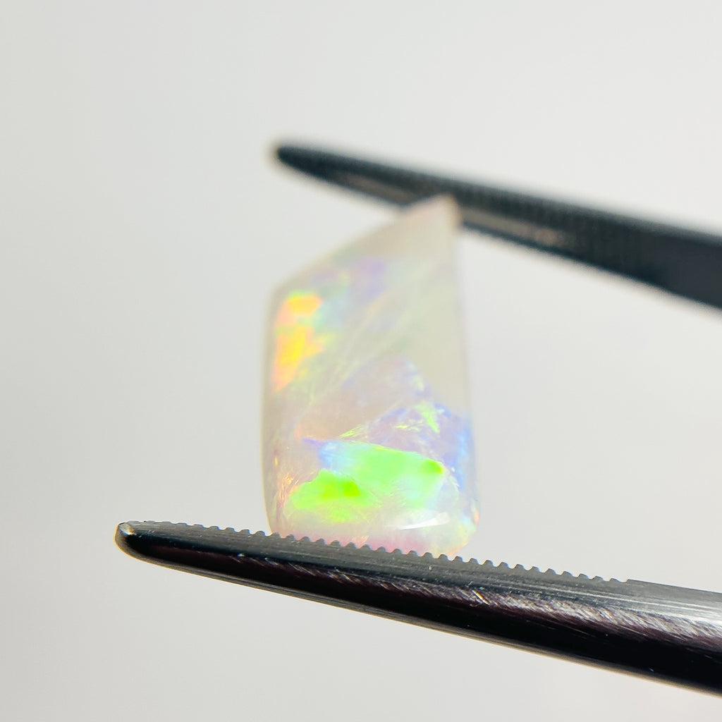 Crystal Opal Red Multicolour 22x8x3.6 Cabochon Freeform 4.75 Carat