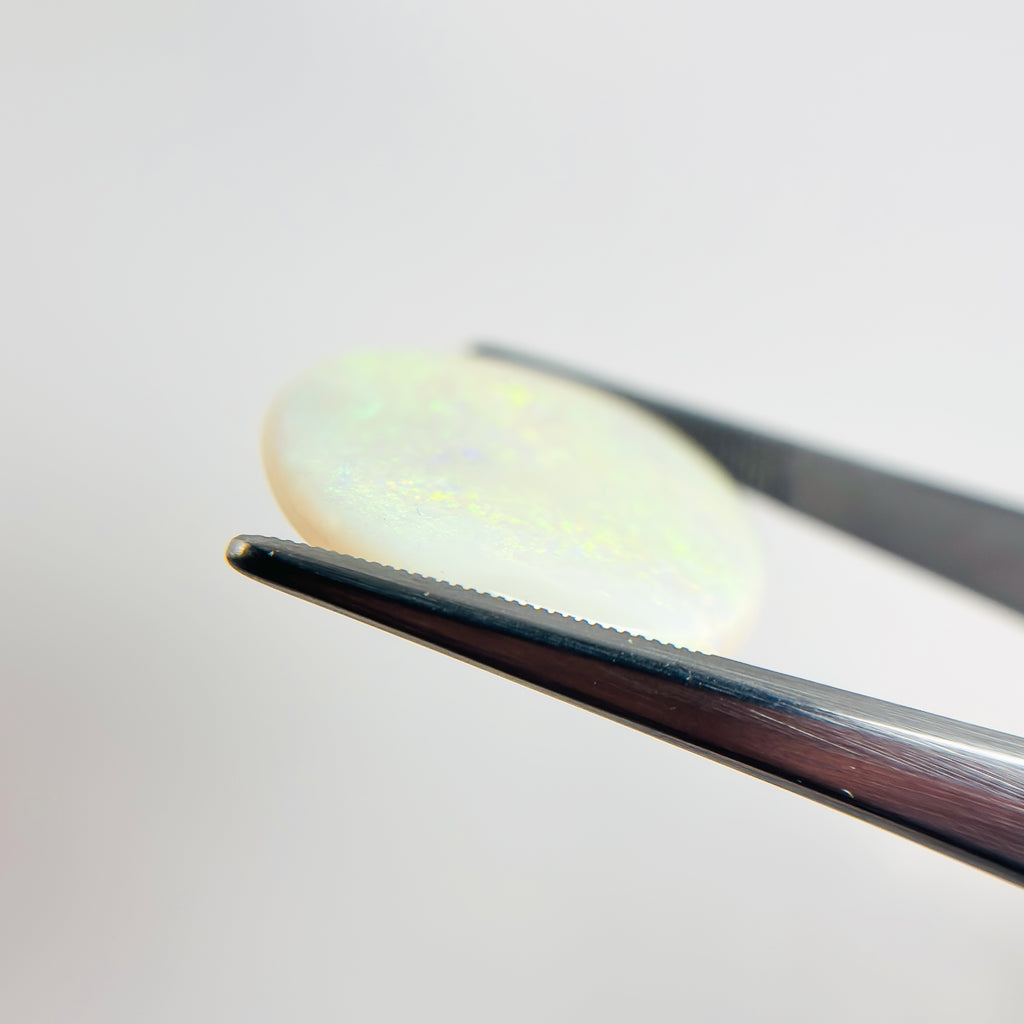 White Opal Multicolour 30x23x5 Cabochon Pear 21.05 Carat
