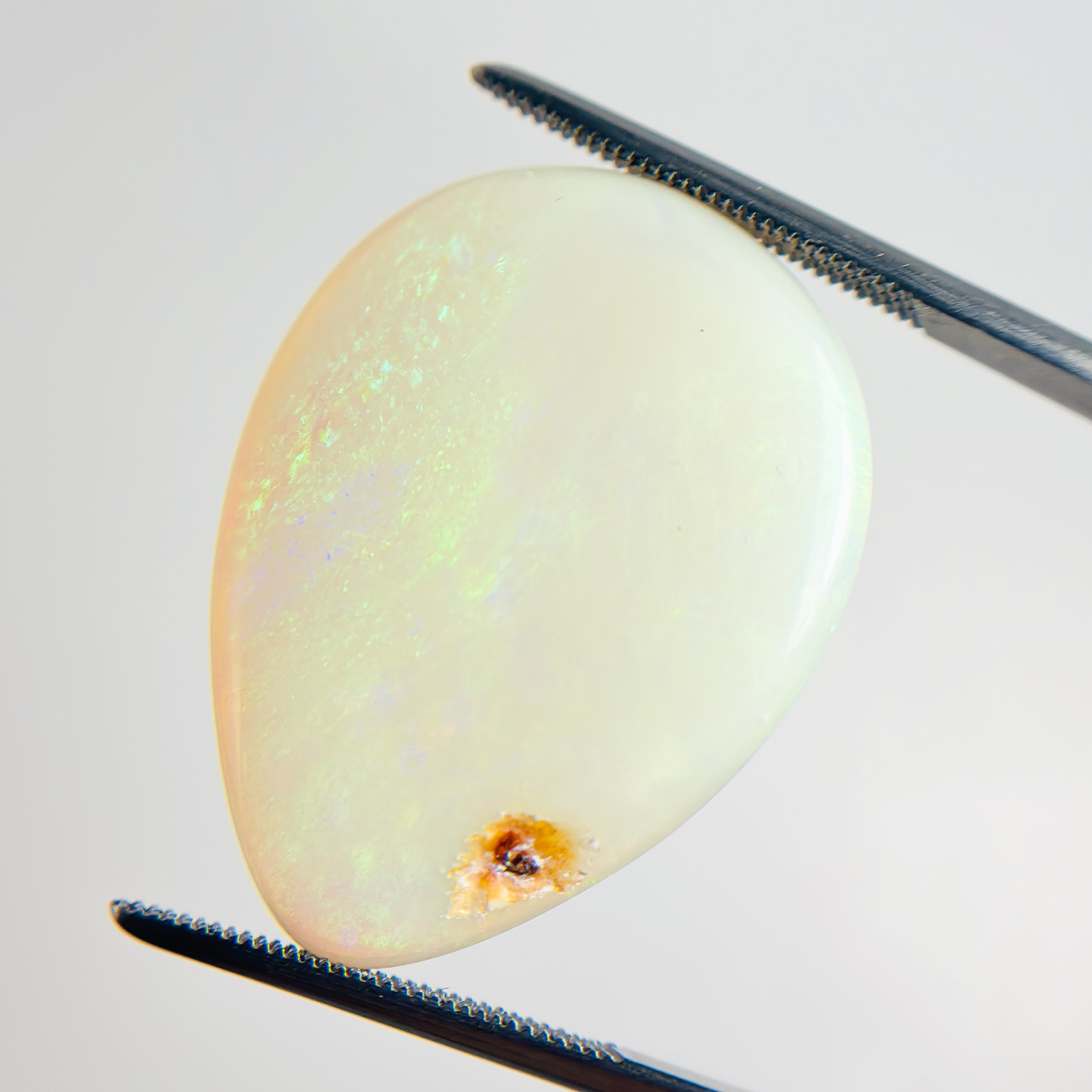 White Opal Multicolour 30x23x5 Cabochon Pear 21.05 Carat