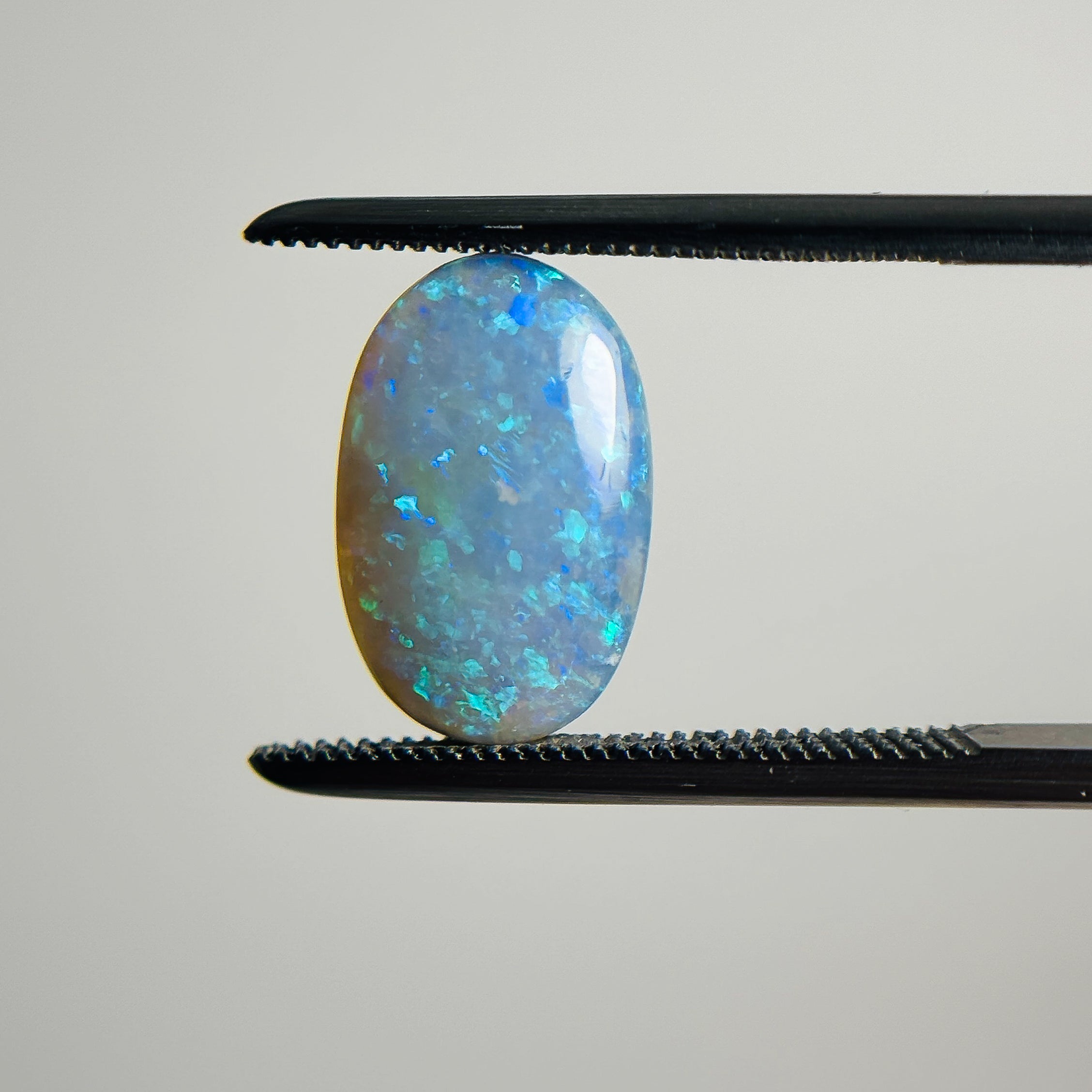 Semi Black Opal Blue Green 12x8x3.2 Cabochon Oval 2.05 Carat
