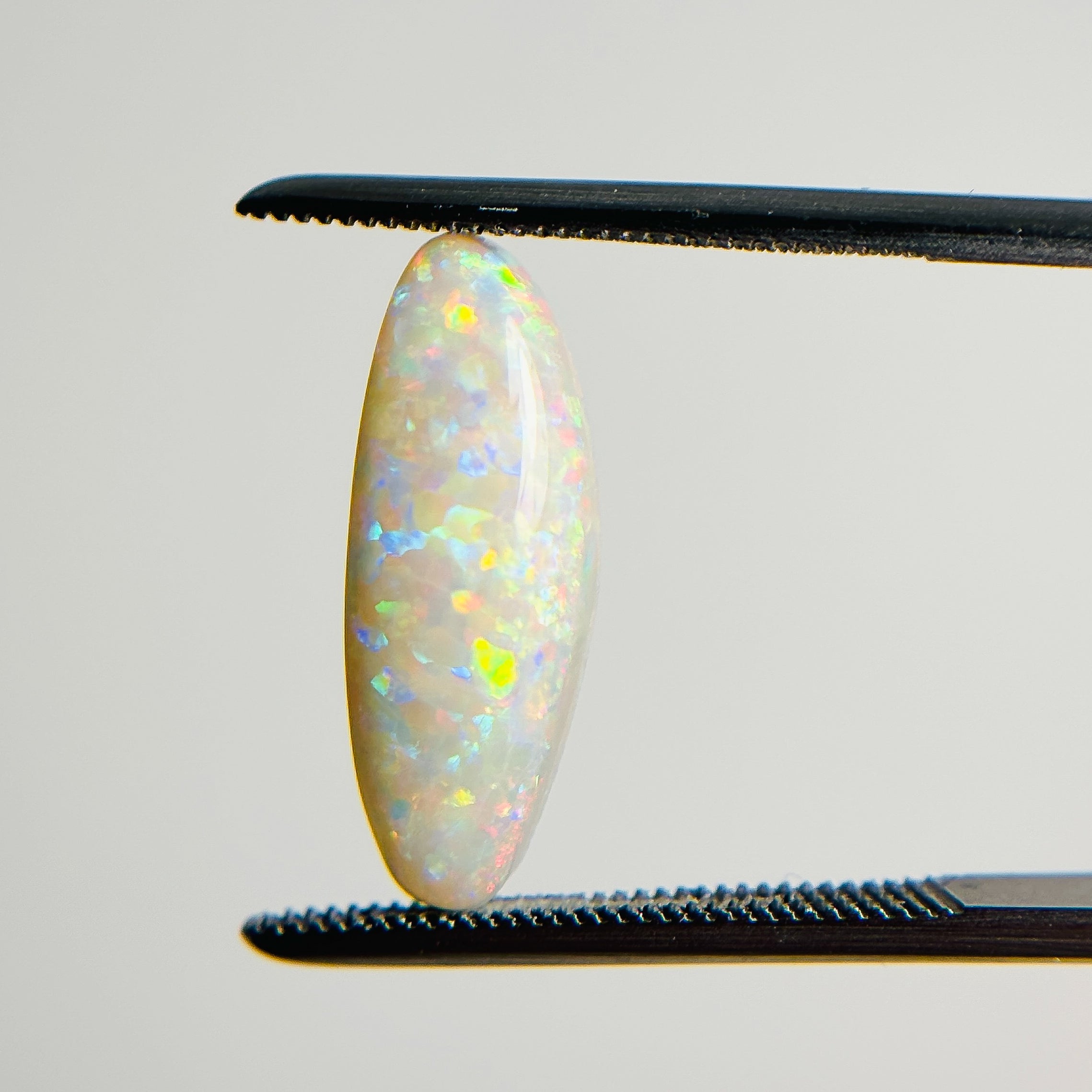 White Opal Multicolour 17x6x4 Cabochon Freeform 2.8 Carat