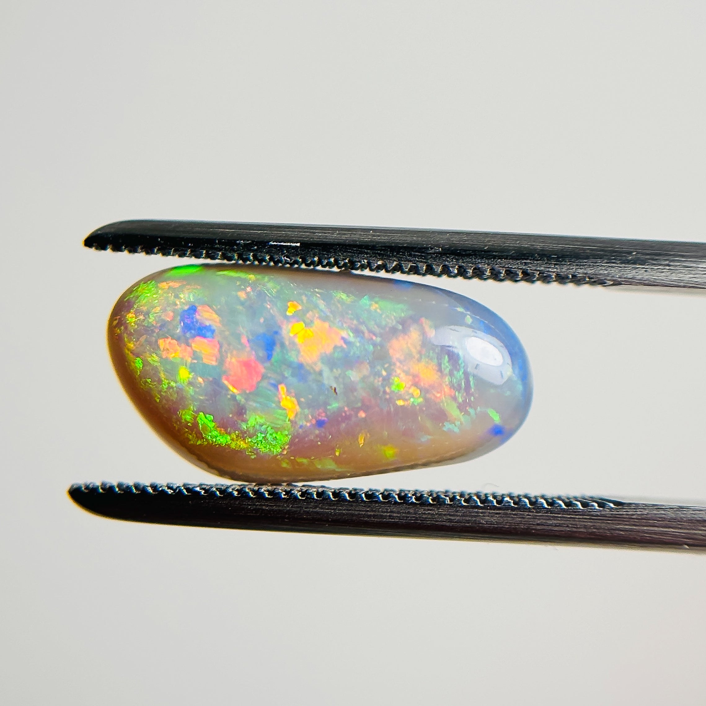 Semi Black Opal Red Multicolour 15x7x5 Cabochon Freeform 3.4 Carat