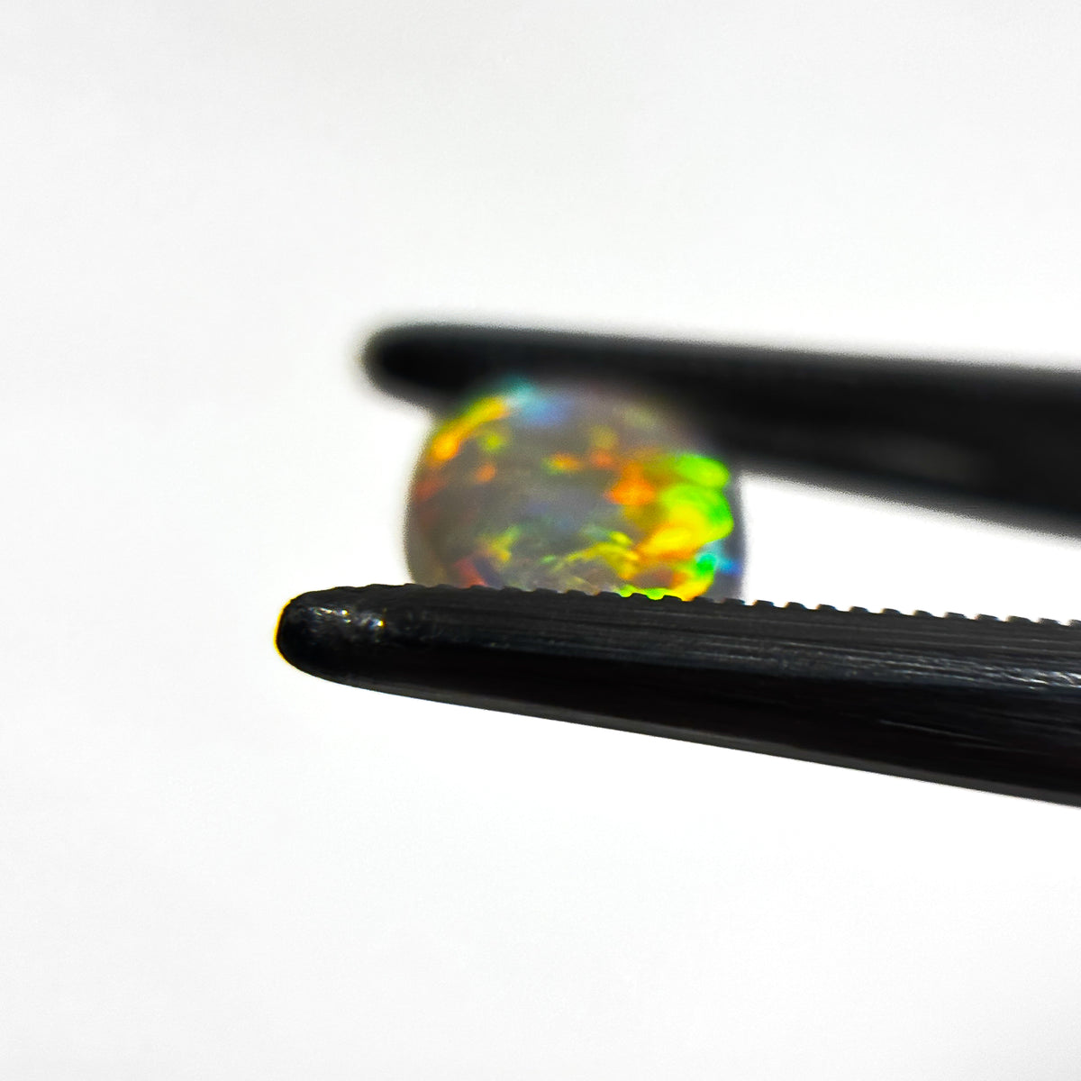 Crystal Opal Red Multicolour 12x7x3 Cabochon Oval 1.6 Carat
