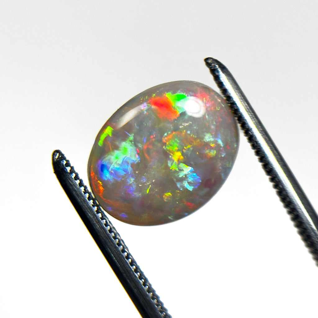 White Opal Red Multicolour 12x9x3 Cabochon Oval 2.45 Carat