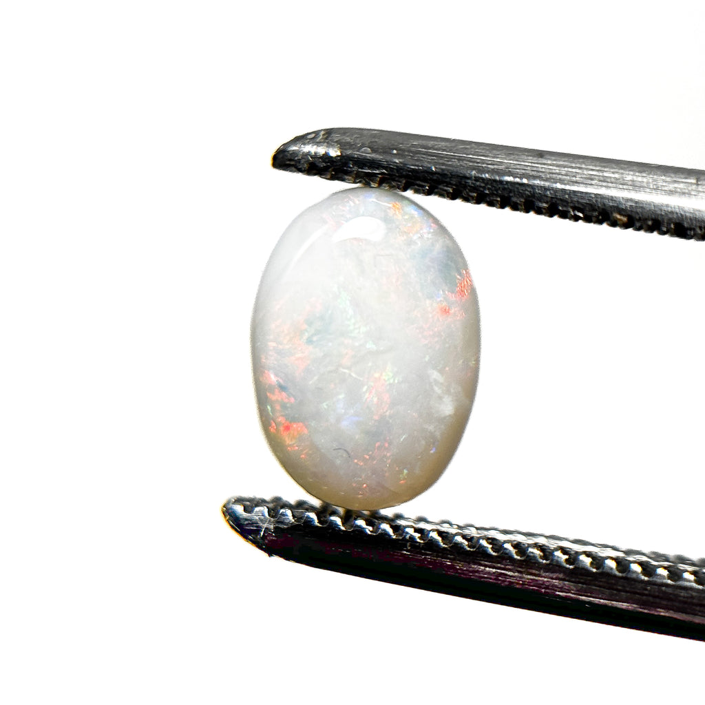 White Opal Multicolour 8x6x3 Cabochon Oval 0.95 Carat