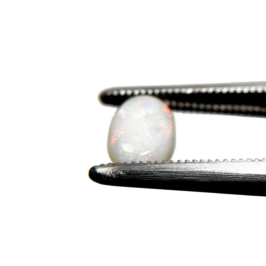 White Opal Multicolour 8x6x3 Cabochon Oval 0.95 Carat