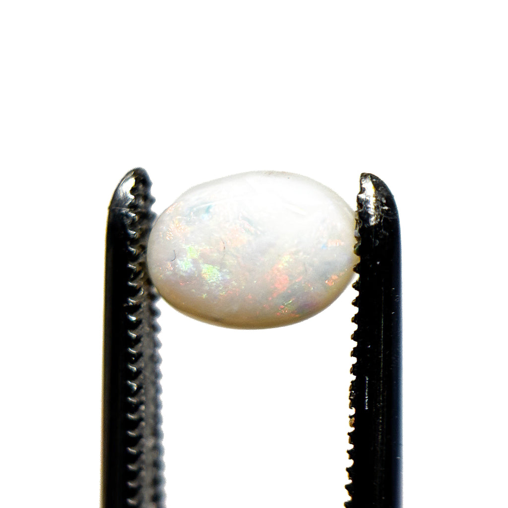 White Opal Multicolour 8x6x3 Cabochon Oval 0.95 Carat