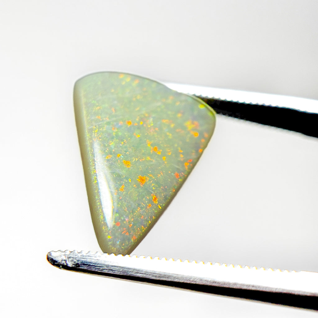 White Opal Red Multicolour 16x12.5x4 Cabochon Pear 4.7 Carat
