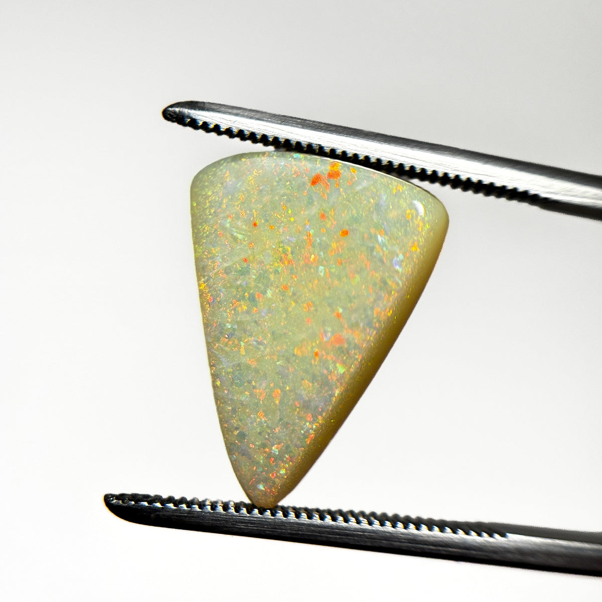 White Opal Red Multicolour 16x12.5x4 Cabochon Pear 4.7 Carat
