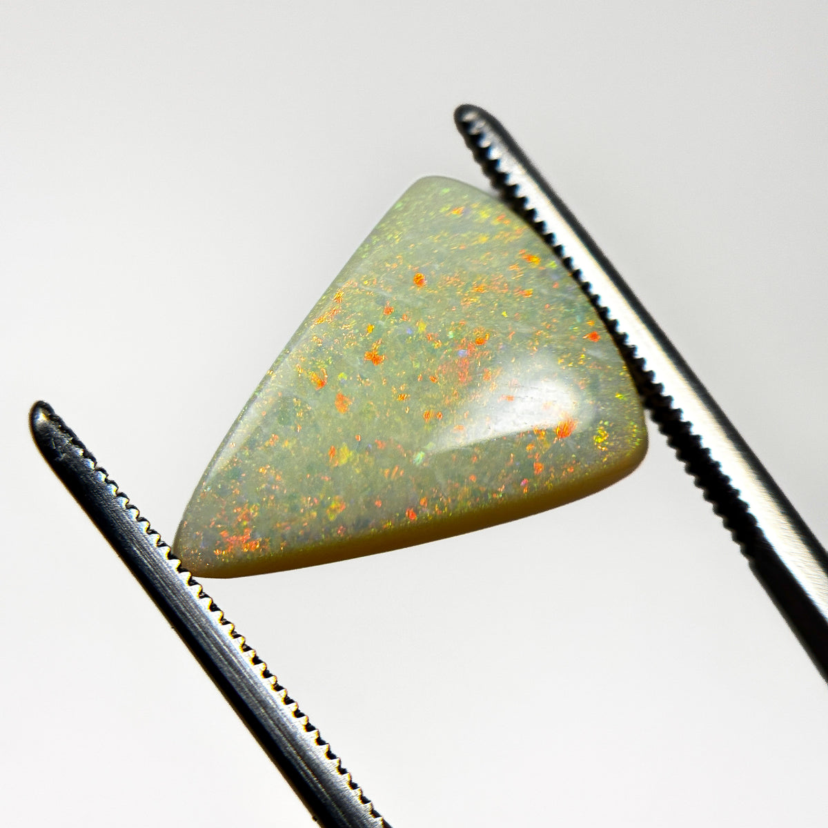 White Opal Red Multicolour 16x12.5x4 Cabochon Pear 4.7 Carat