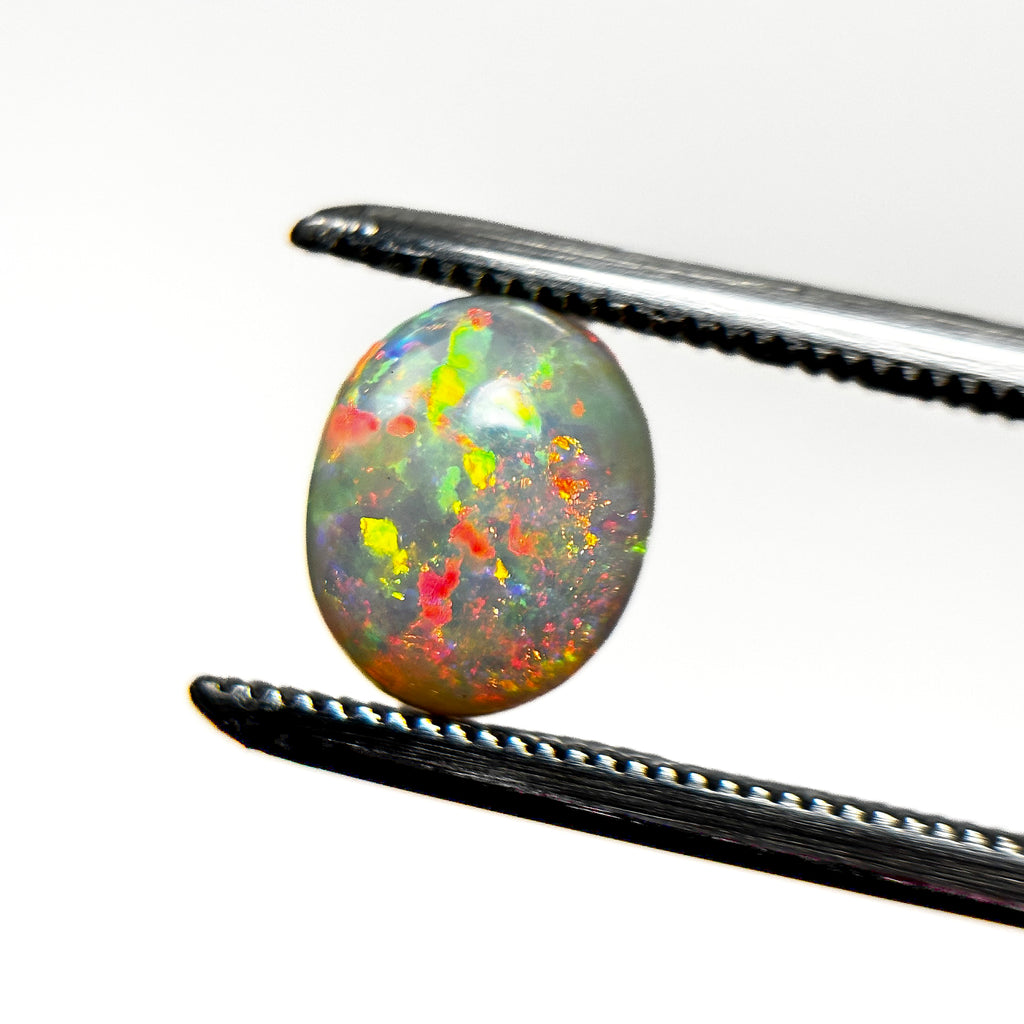 Crystal Opal Red Multicolour 8x6x4 Cabochon Oval 1.25 Carat