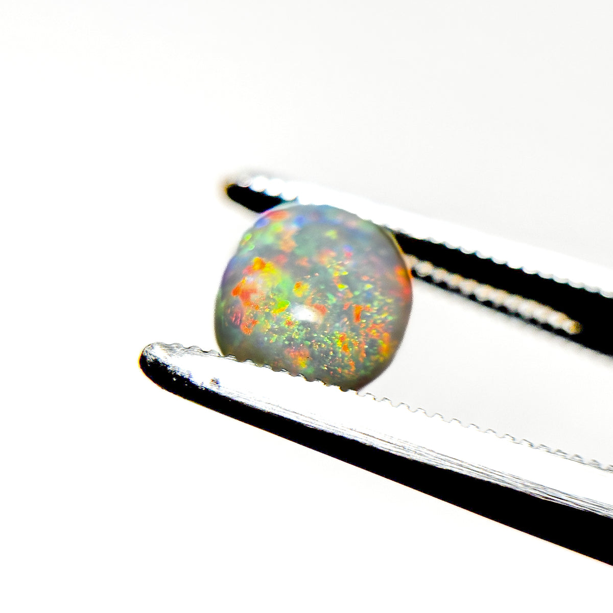 Crystal Opal Red Multicolour 8x6x4 Cabochon Oval 1.25 Carat