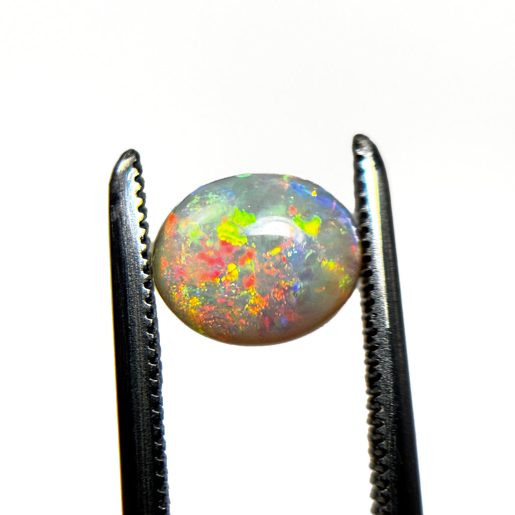 Crystal Opal Red Multicolour 8x6x4 Cabochon Oval 1.25 Carat