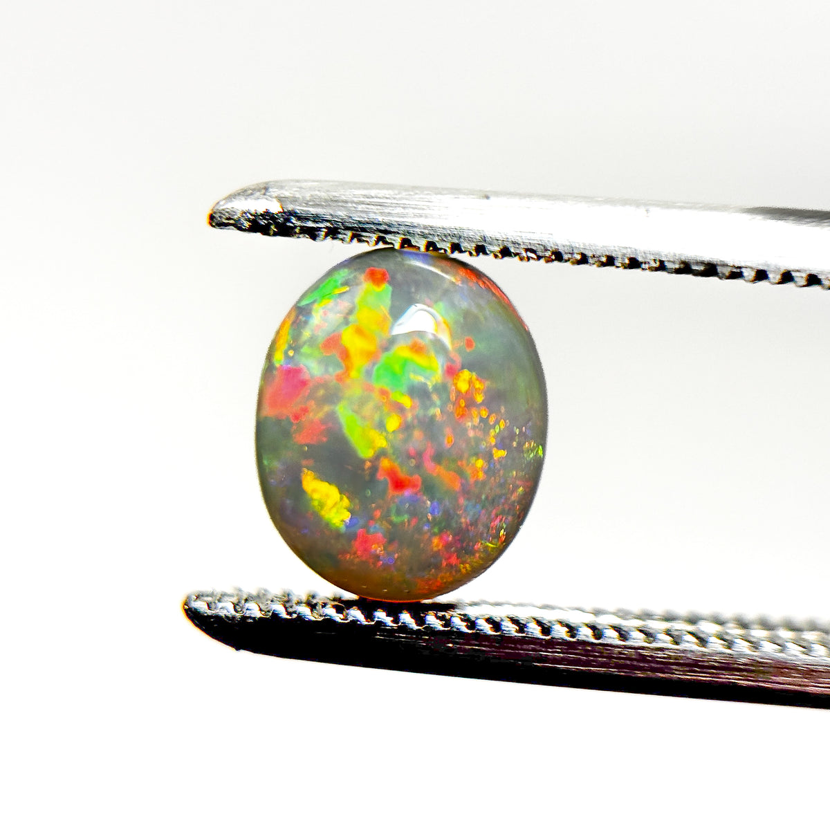 Crystal Opal Red Multicolour 8x6x4 Cabochon Oval 1.25 Carat