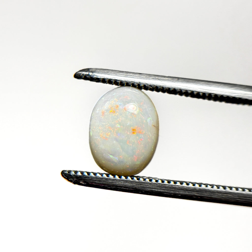 White Opal Red Multicolour 8x6.5x4 Cabochon Oval 1.35 Carat