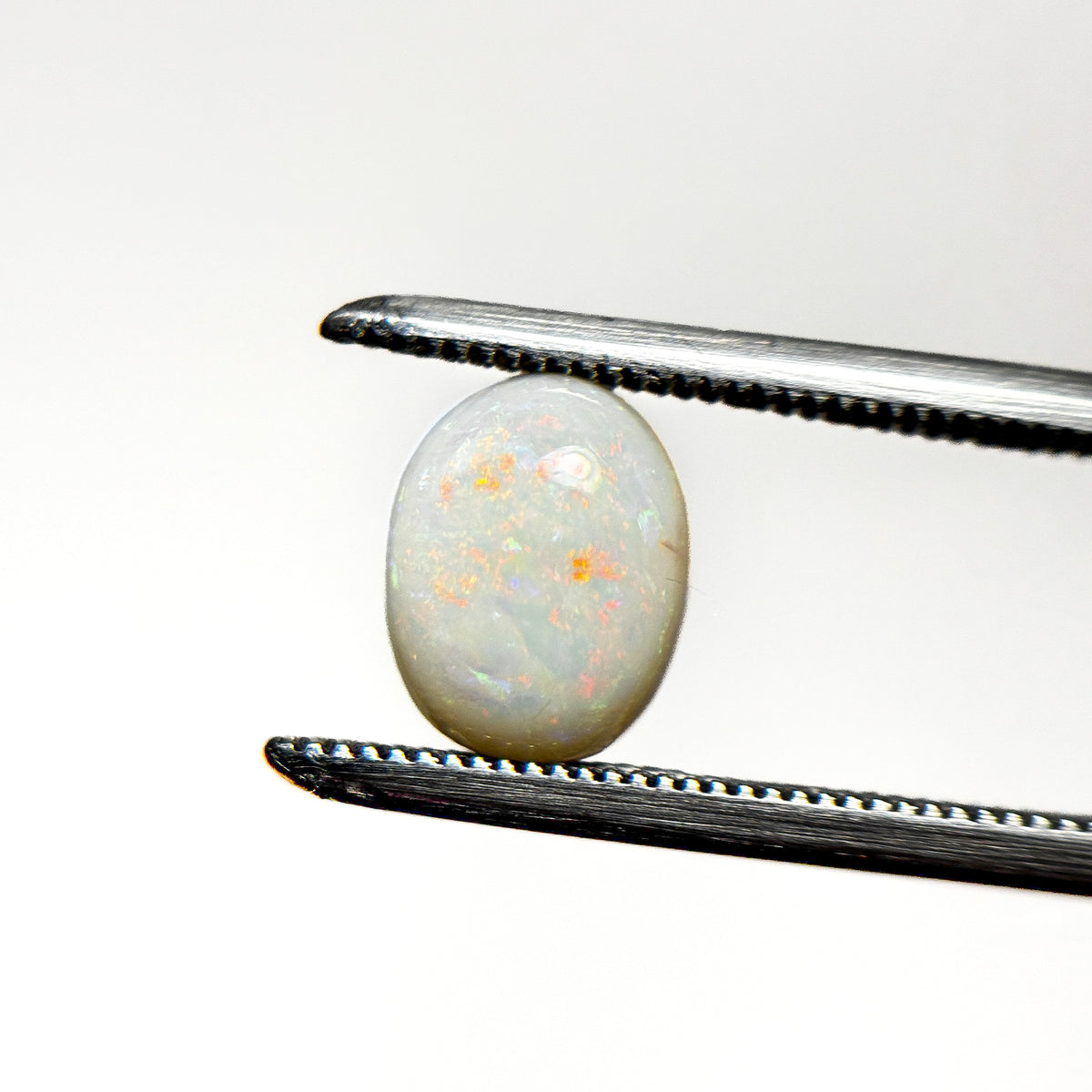 White Opal Red Multicolour 8x6.5x4 Cabochon Oval 1.35 Carat