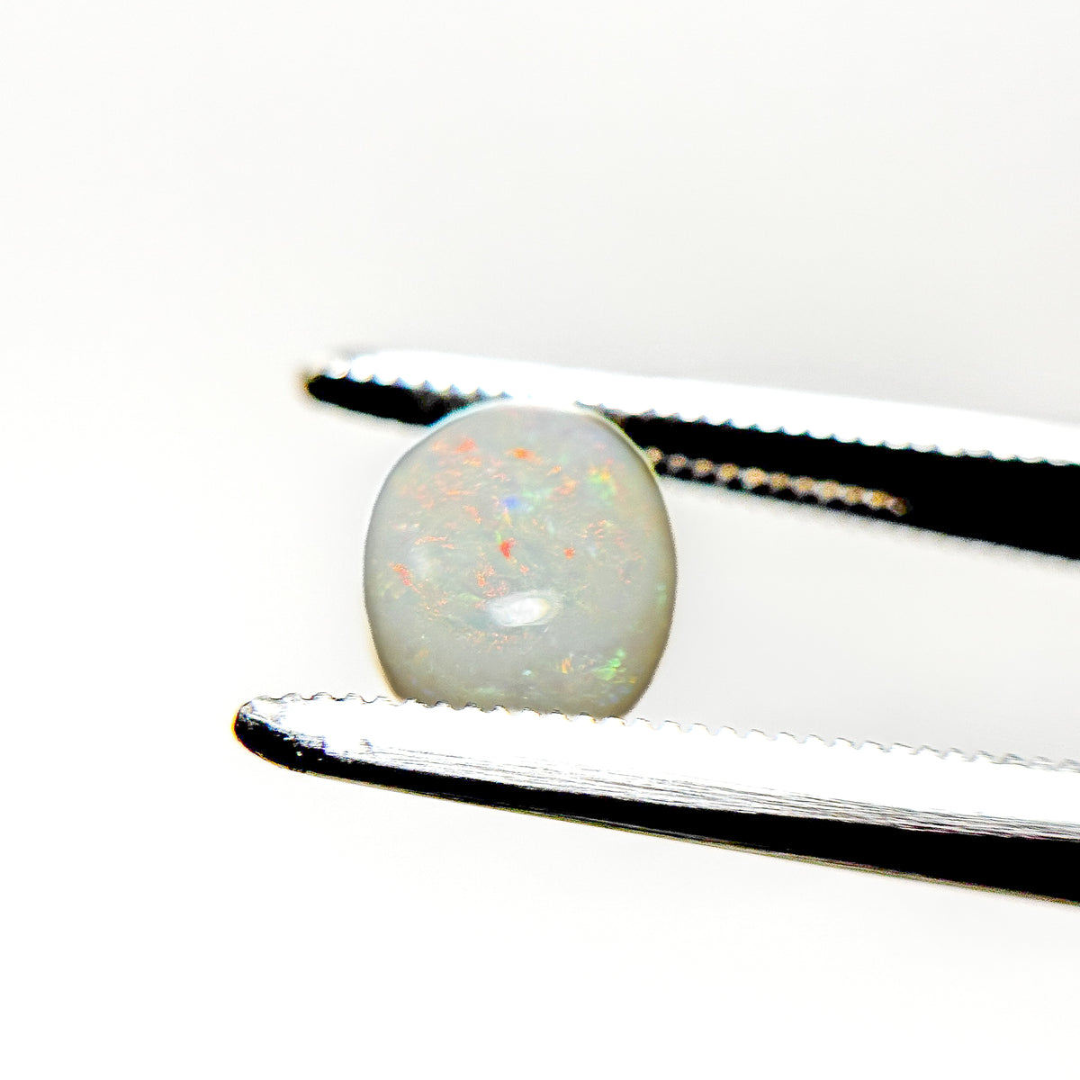 White Opal Red Multicolour 8x6.5x4 Cabochon Oval 1.35 Carat