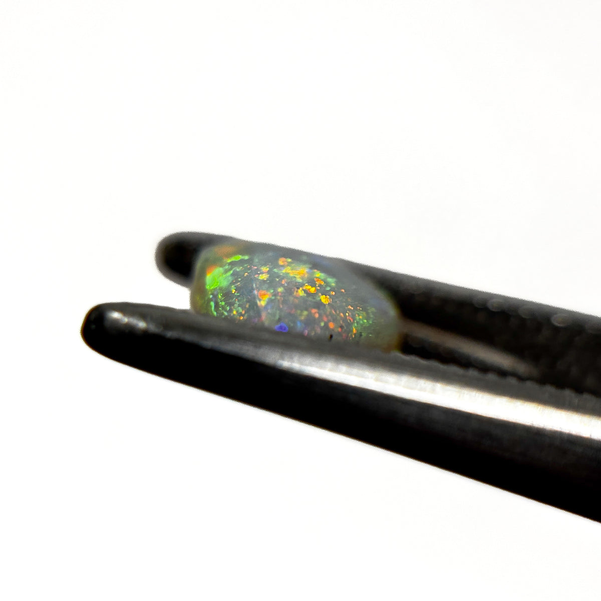 Crystal Opal Red Multicolour 9x7x3 Cabochon Pear 1.25 Carat
