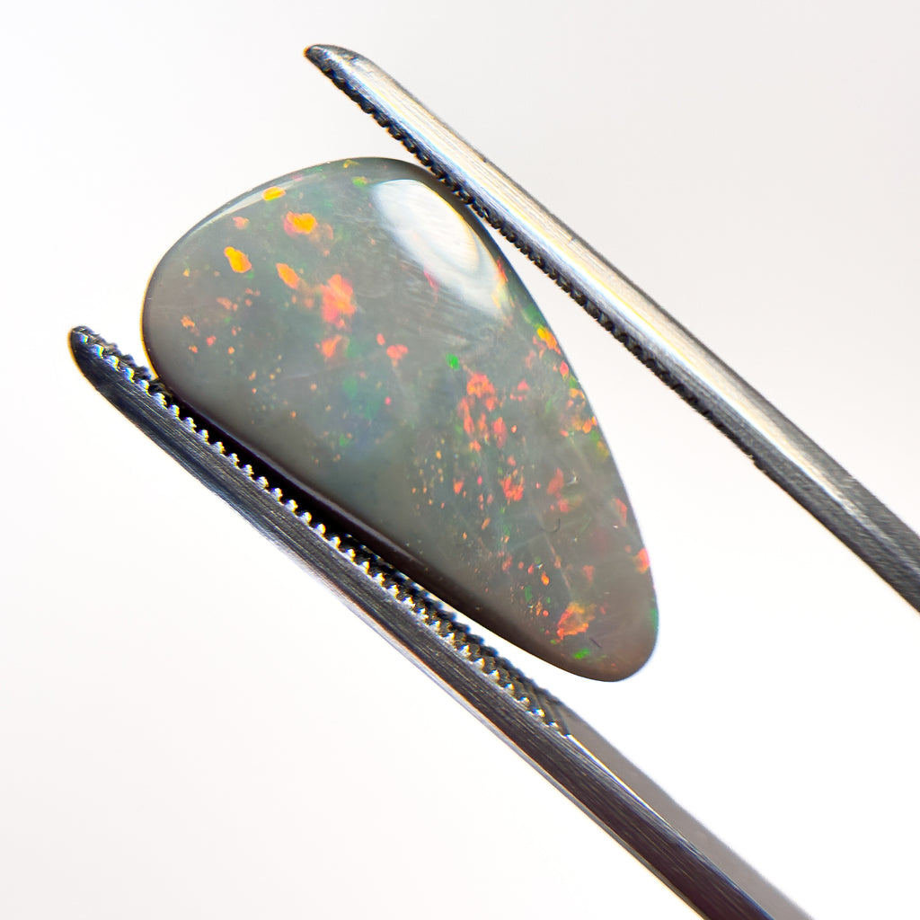 Semi Black Opal Red Multicolour 10x6.5x3.3 Cabochon Freeform 4.1 Carat