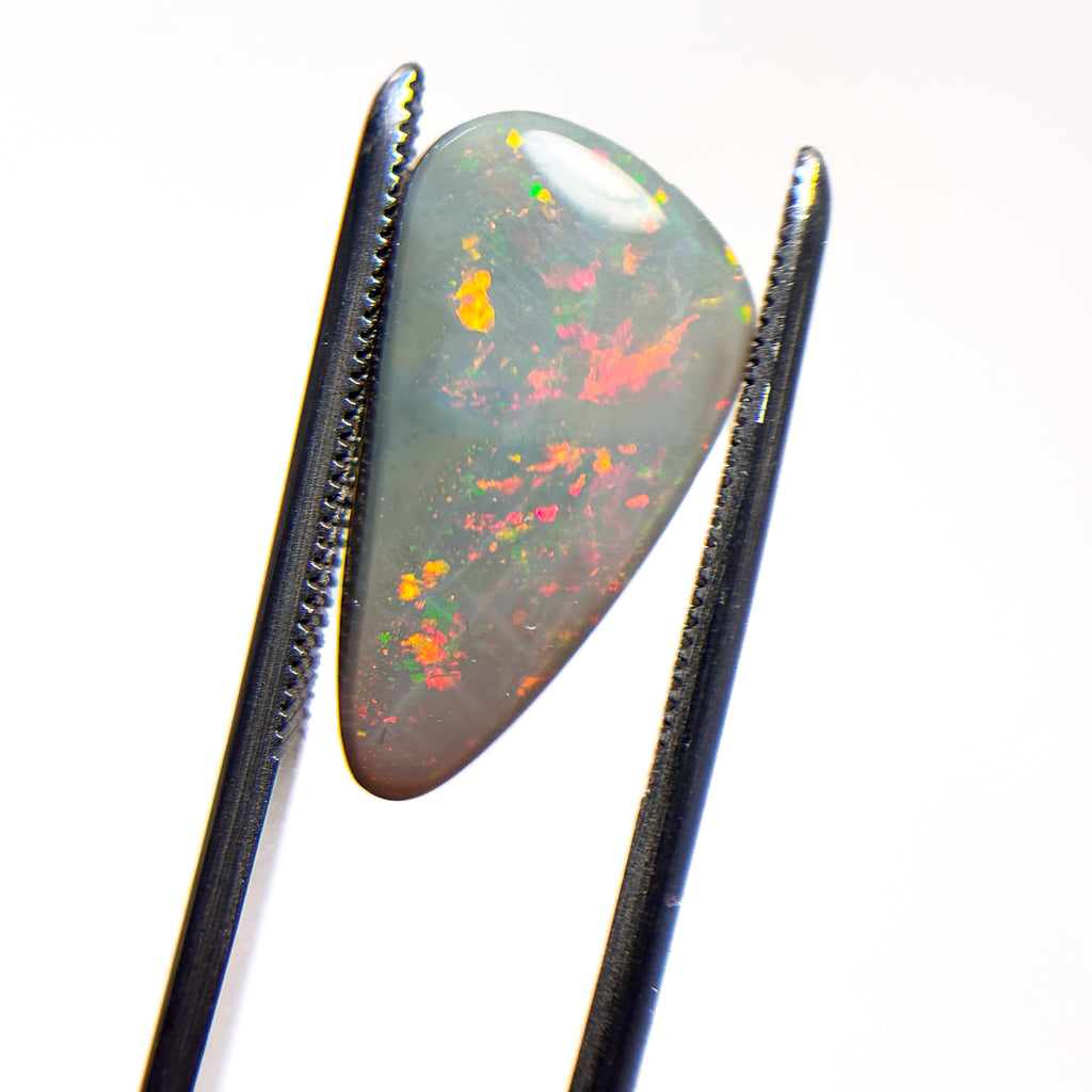 Semi Black Opal Red Multicolour 10x6.5x3.3 Cabochon Freeform 4.1 Carat