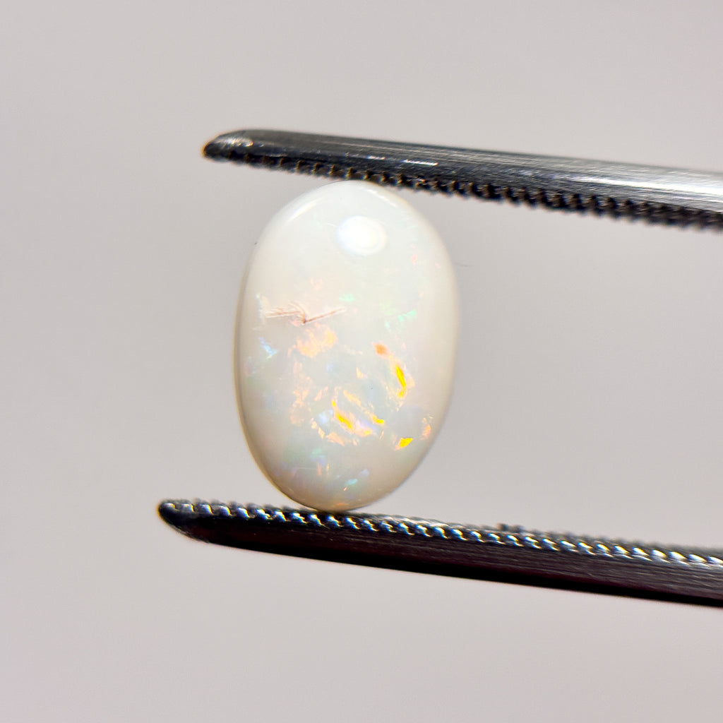 White Opal Multicolour 10x7x3.5 Cabochon Oval 1.8 Carat