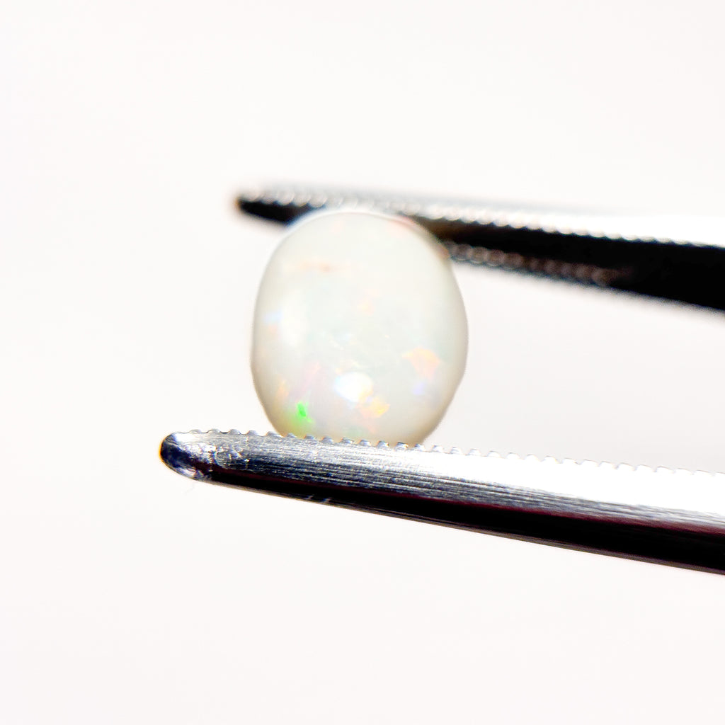 White Opal Multicolour 10x7x3.5 Cabochon Oval 1.8 Carat