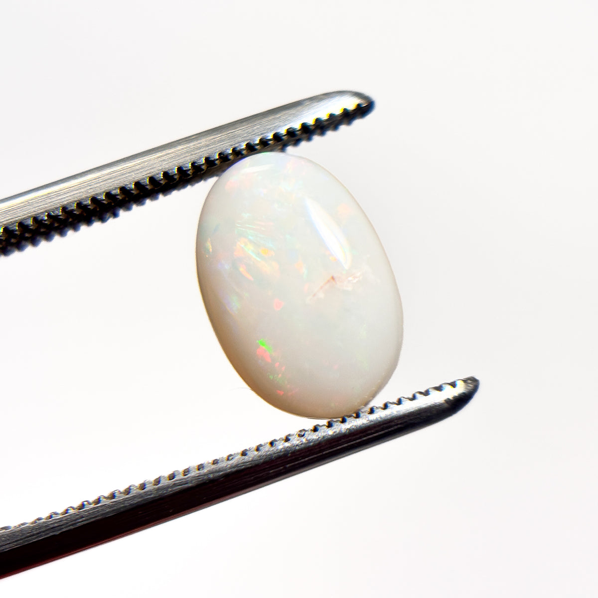 White Opal Multicolour 10x7x3.5 Cabochon Oval 1.8 Carat