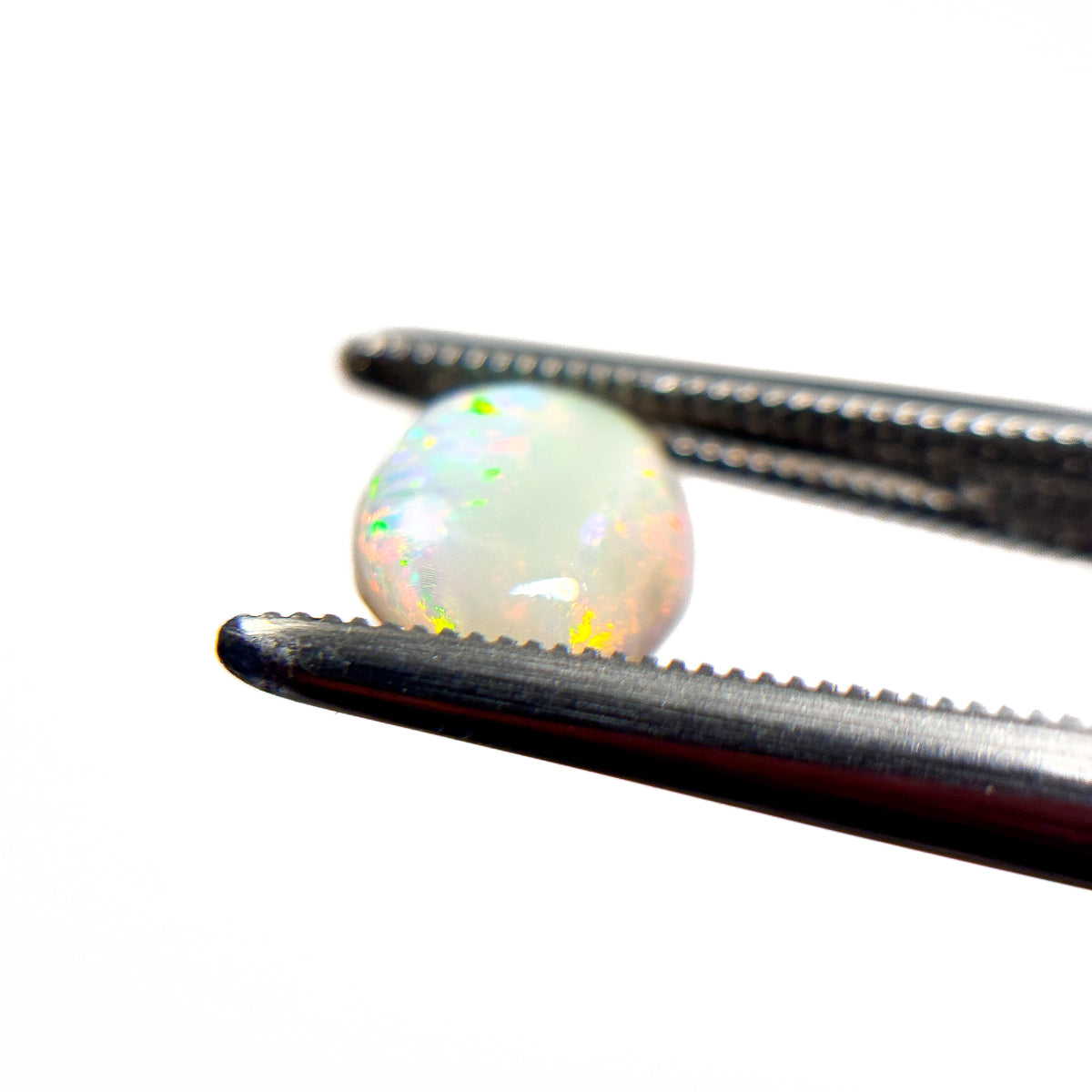 White Opal Red Multicolour 8x7x3 Cabochon Oval 1.2 Carat