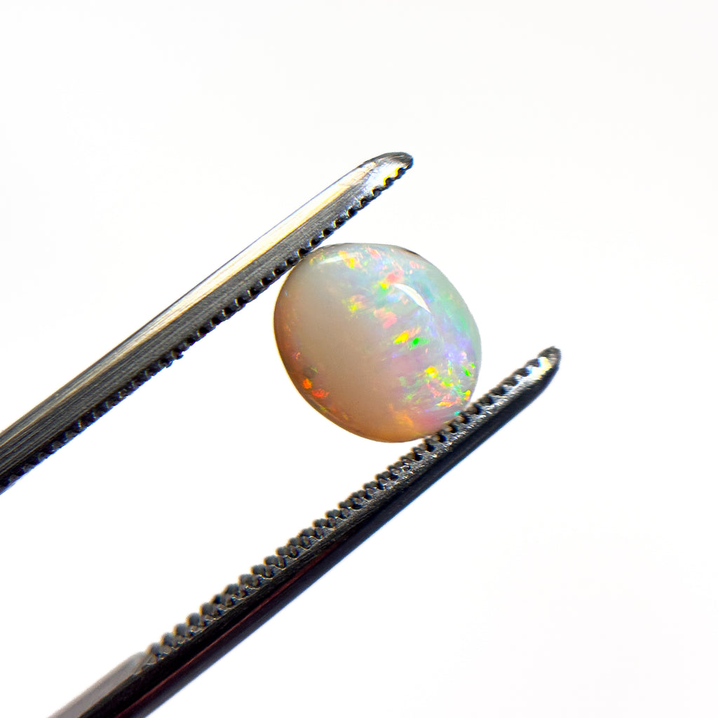 White Opal Red Multicolour 8x7x3 Cabochon Oval 1.2 Carat