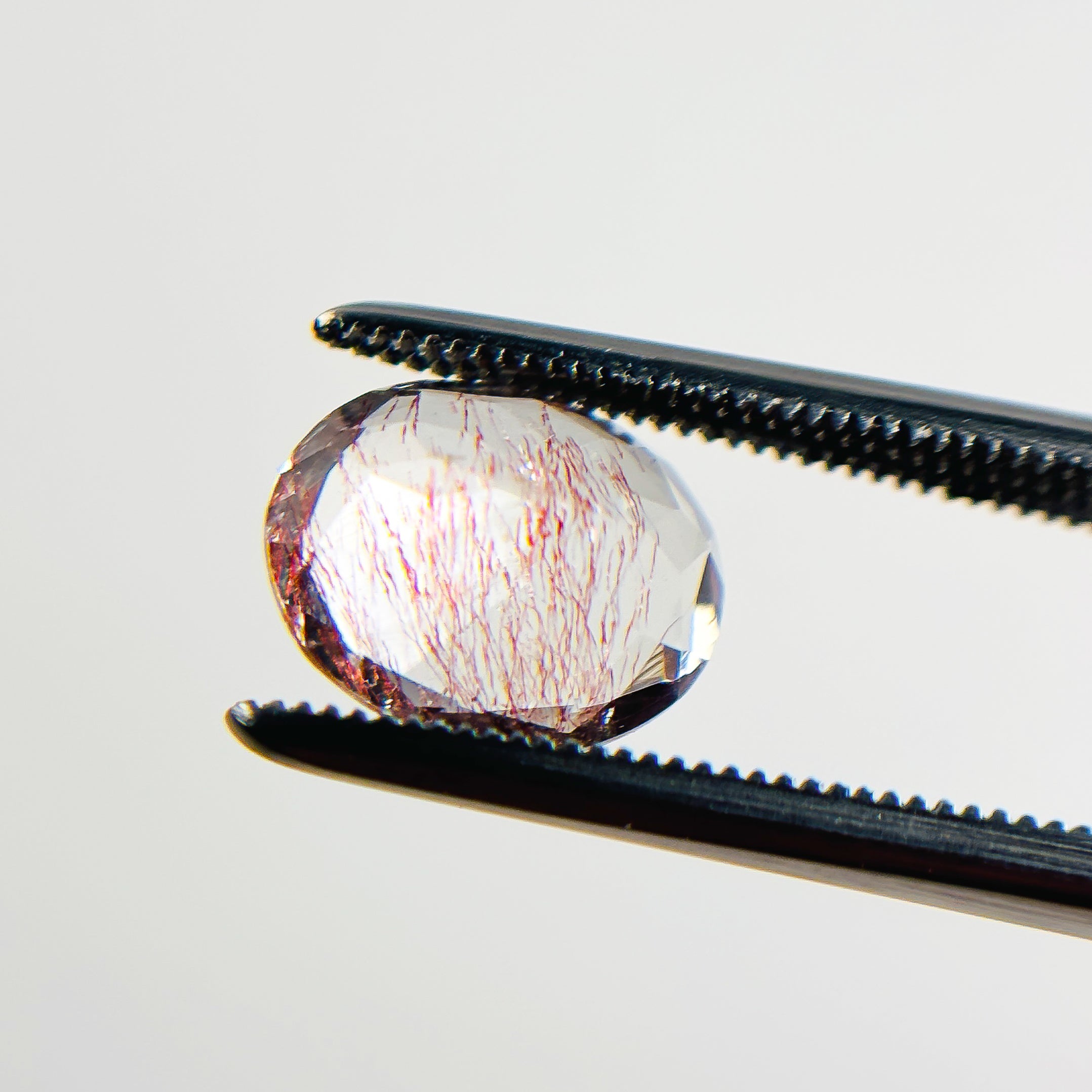 Clear Pink Rutilted Quartz 10x8x5.4 Facet Oval 2.5 Carat