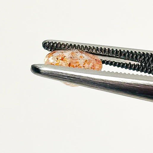 Sunstone Confetti 8x6x4 Faceted Oval 1.36 Carat
