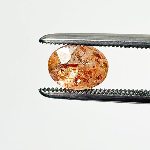Sunstone Confetti 8x6x4 Faceted Oval 1.36 Carat