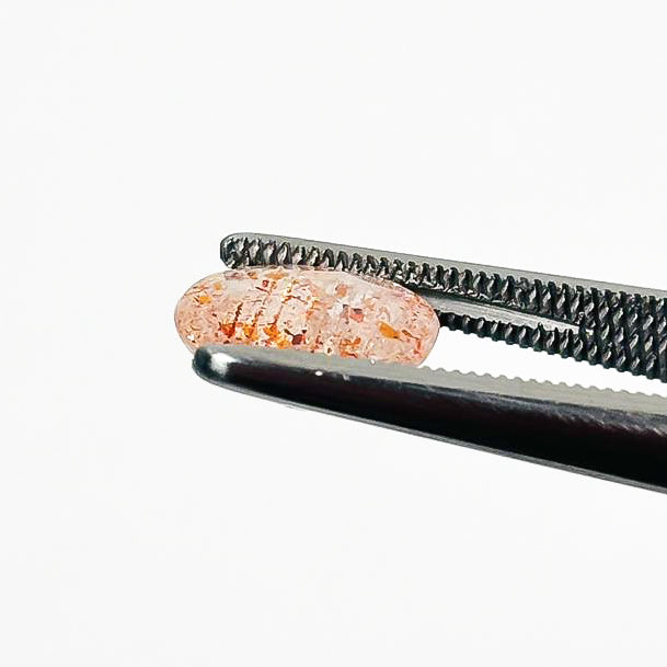 Sunstone Confetti 10x8x5 Faceted Oval 2.17 Carat