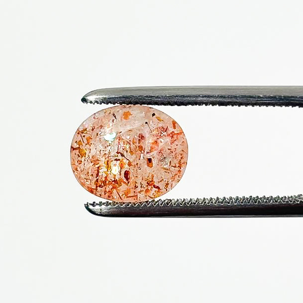 Sunstone Confetti 10x8x5 Faceted Oval 2.17 Carat