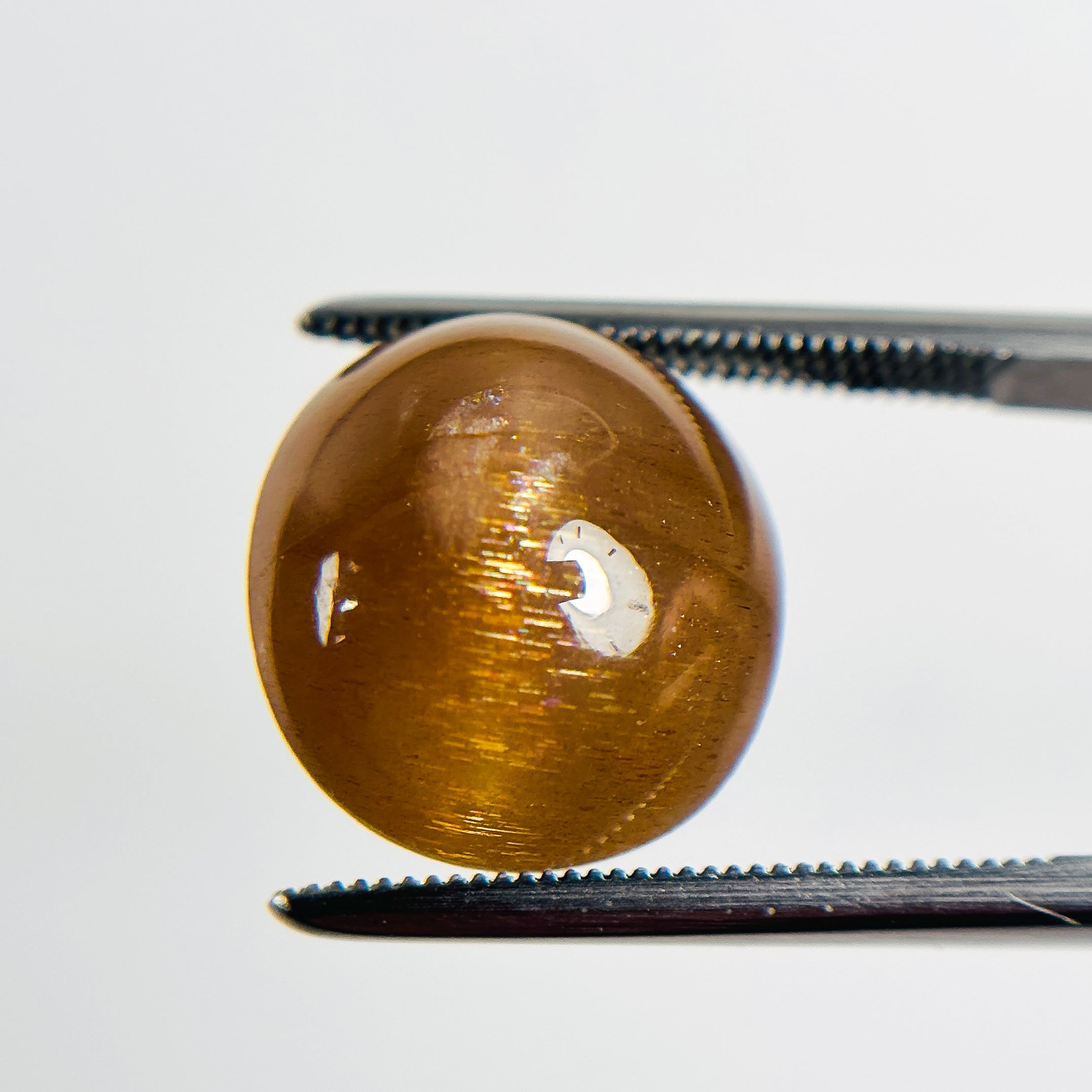 Sunstone Cats Eye 14x12x9 Cabochon Oval 11.50 Carat