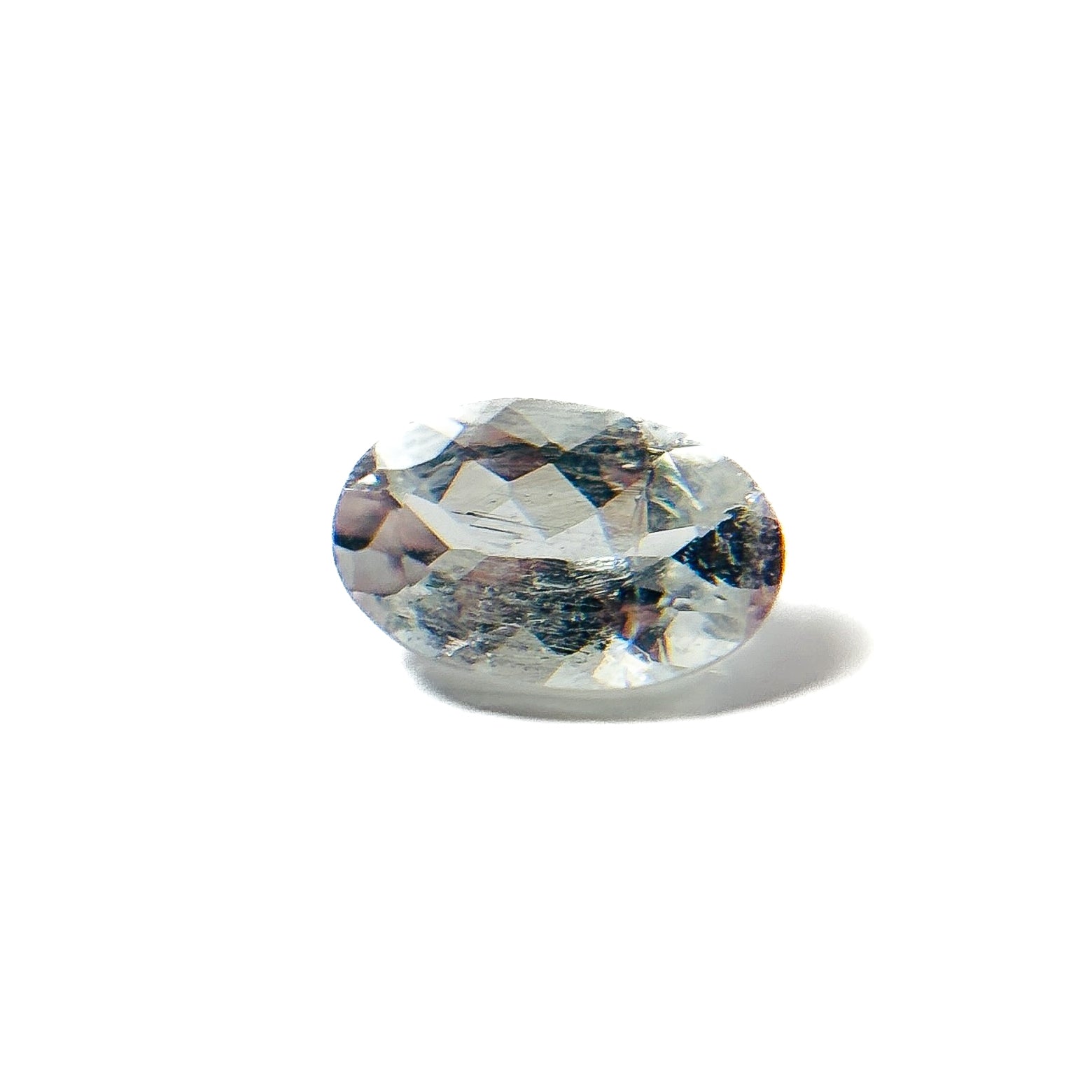White Tourmaline 6x4.9x2.7 Facet Oval 0.40 Carat