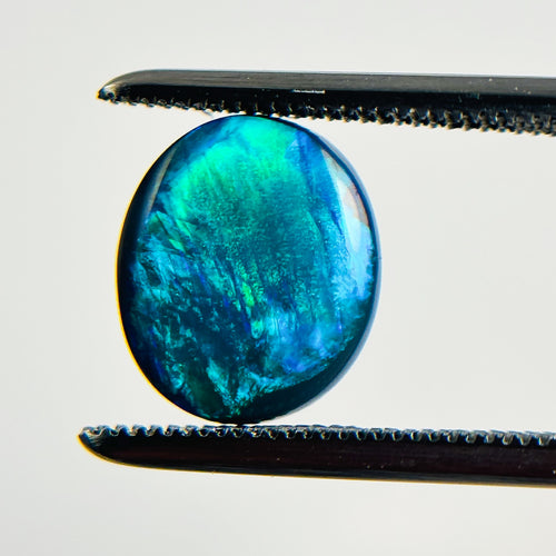 Black Opal Blue Green 10x8x3 Cabochon Oval 1.60 Carat